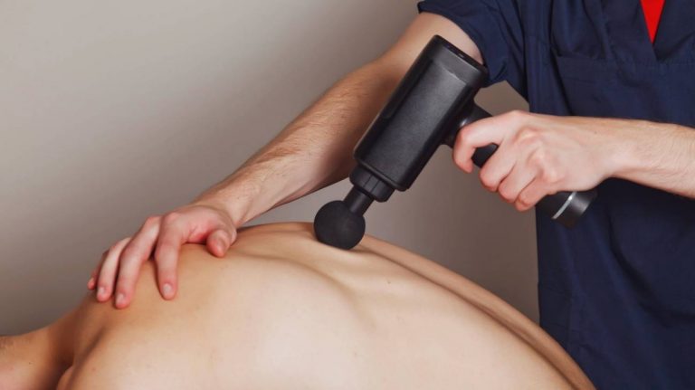 How to use a electric massager gun for back pain relief?