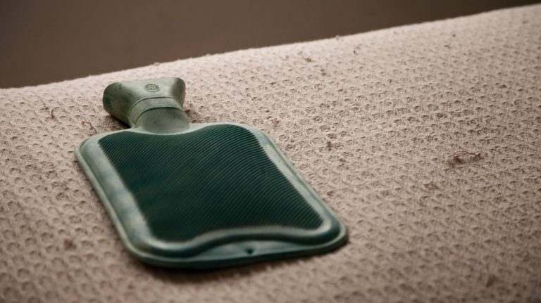 When do I use a microwave heating pads vs hot water bottle for pain relief?