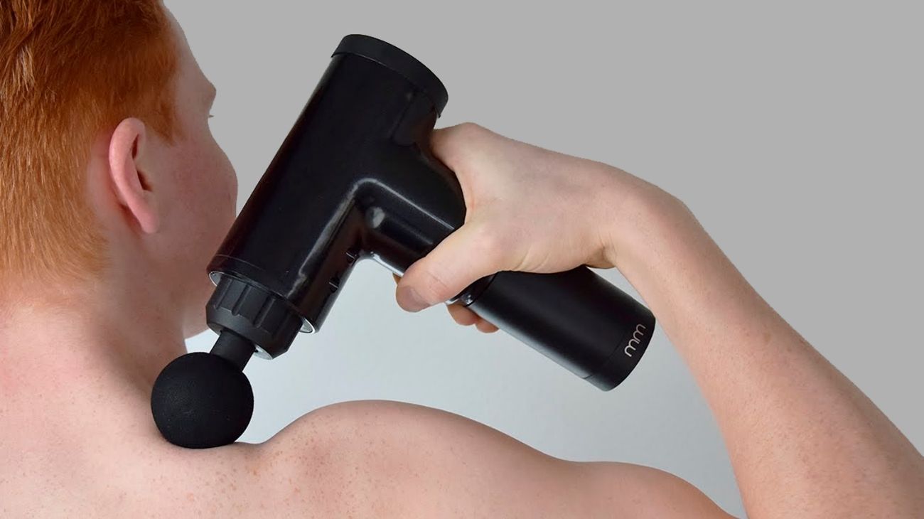 ¿Qué tipos de cabezal para la pistola de masaje debo usar por cada zona corporal y tipo de lesión?